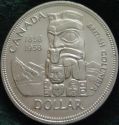 1958 Queen Elizabeth II Commemorative Dollar - reverse cleaned coin.